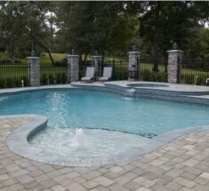 Concrete Pool with Spa, Spa Spillover, Sunshelf and Bubblers