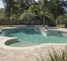 Concrete Pool with Spa, Spa Spillover, and Sunshelf