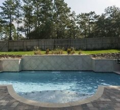 Concrete Pool with Sunshelf and Sheer Descents