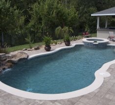 Custom Pool and Spa with Bubbler and Rock Waterfall