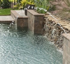Custom Pool and Spa with Sheer Descent and Bubbler
